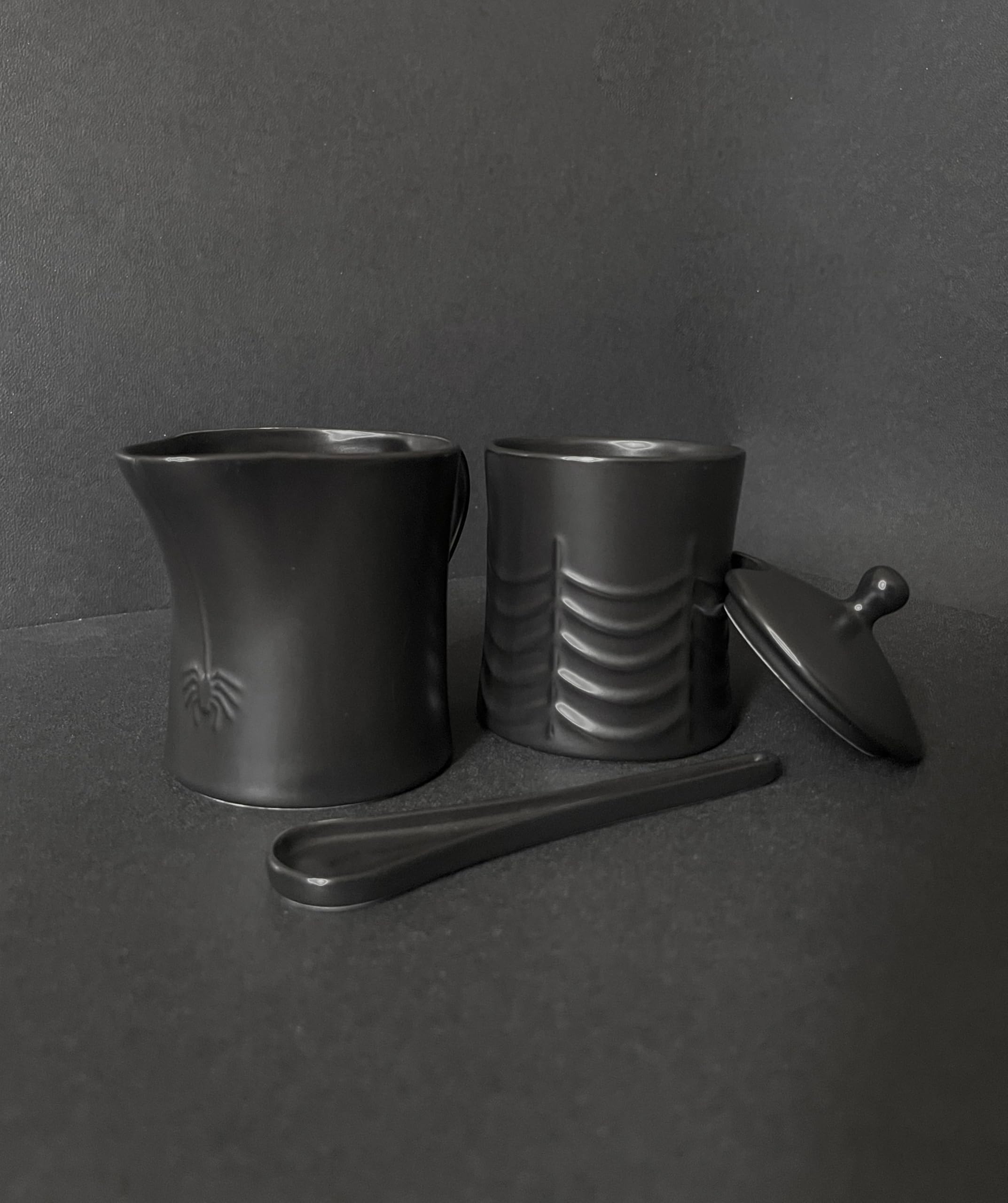 New - Nomnu Black Spiderweb Sugar and Creamer Set. Ceramic Sugar Bowl with Lid and Spoon, and Creamer Pitcher. Gothic Decor, Perfect for Goth Lovers, Includes Spider-Embossed Design